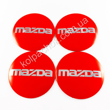 Наклейки для колпачков на диски Mazda надпись красные (56мм) Наклейки для колпачков на диски Mazda надпись красные (56мм)