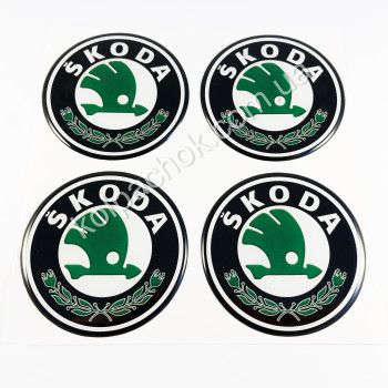 Наклейки для колпачков на диски Skoda черные/зеленый лого (70мм) Наклейки для колпачков на диски Skoda черные/зеленый лого (70мм)