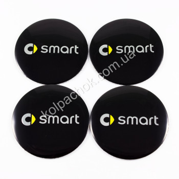 Наклейки для ковпачків на диски Smart чорні (56мм) Наклейки для ковпачків на диски Smart чорні (56мм)