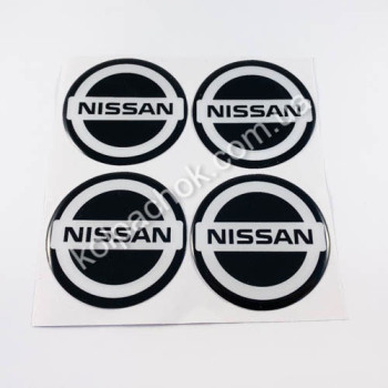 Наклейки для ковпачків на диски Nissan чорний/білий лого (55мм) Наклейки для ковпачків на диски Nissan чорний/білий лого (55мм)