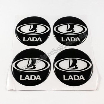 Наклейки для колпачков на диски Lada черные/белый лого (55мм) Наклейки для колпачков на диски Lada черные/белый лого (55мм)