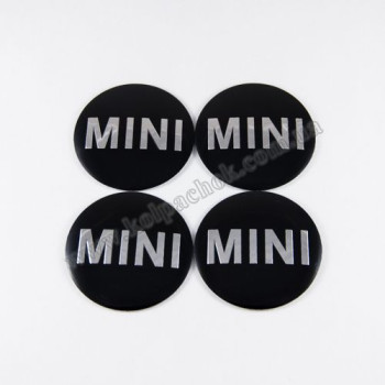 Наклейки для ковпачків на диски MINI чорні (50мм) Наклейки для ковпачків на диски MINI чорні (50мм)