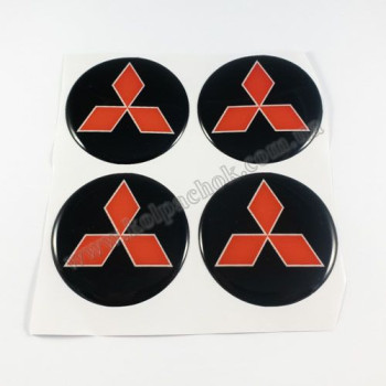 Наклейки для ковпачків на диски Mitsubishi чорні/червоний лого (55мм) Наклейки для ковпачків на диски Mitsubishi чорні/червоний лого (55мм)