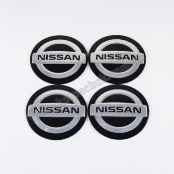 Наклейки для ковпачків на диски Nissan чорні сфера (60мм) Наклейки для ковпачків на диски Nissan чорні сфера (60мм)