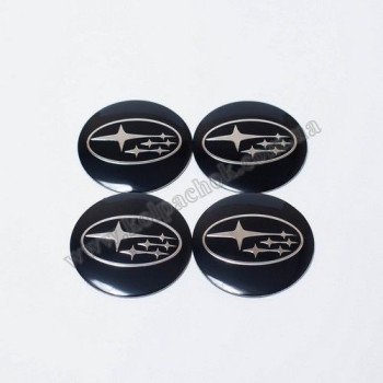 Наклейки для колпачков на диски Subaru черные/хром лого (56мм) Наклейки для колпачков на диски Subaru черные/хром лого (56мм)