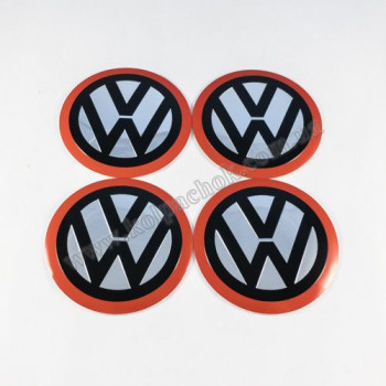 Наклейки для ковпачків на диски VolksWagen червоний кант (65мм) Наклейки для ковпачків на диски VolksWagen червоний кант (65мм)